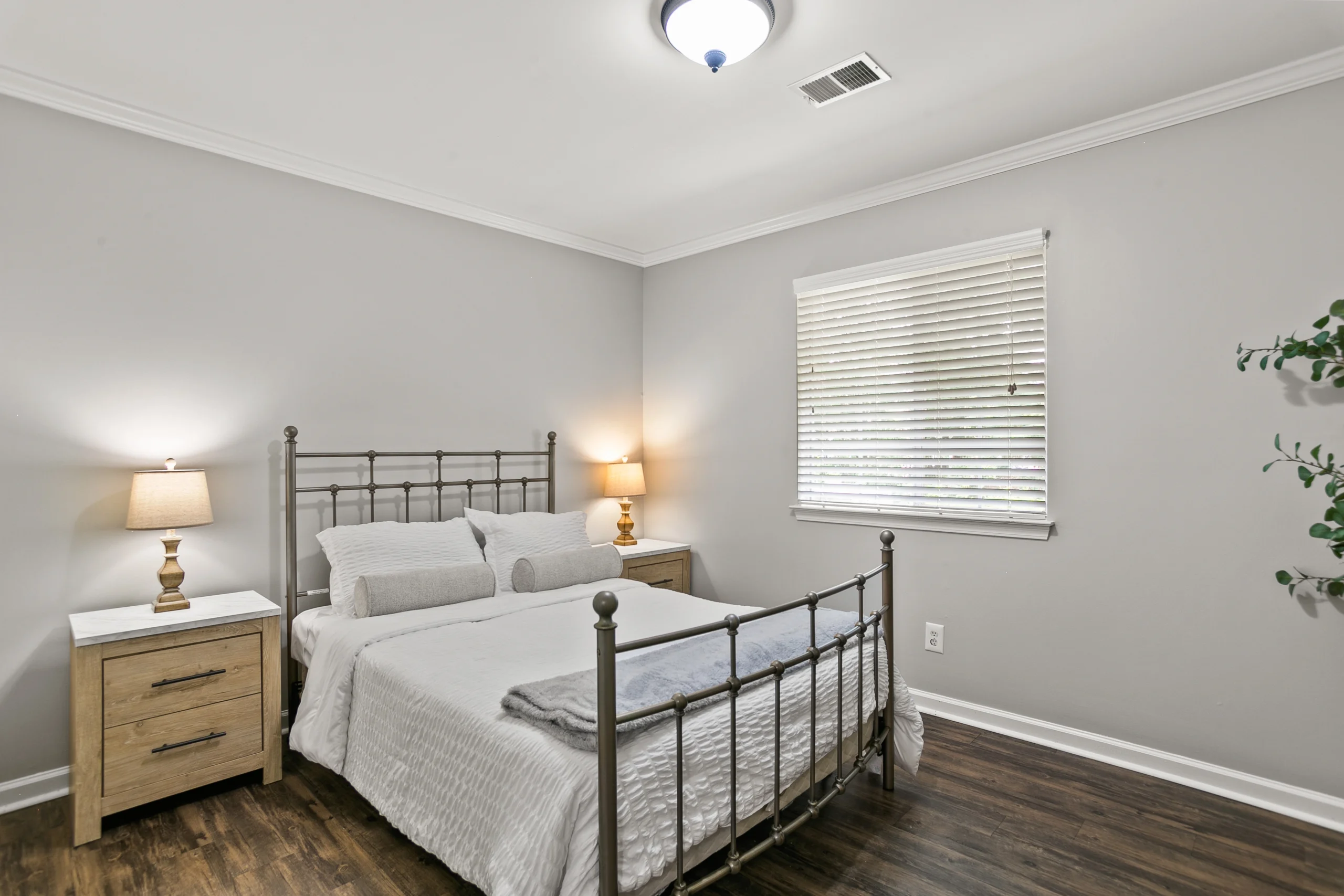 bed room view of one the the rooms at bellevue village at neeseroad
